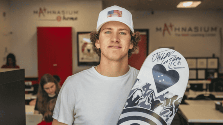 Jagger Eaton and Mathnasium Showcase Kickflips & Kindness With New Scholarship Jagger Eaton holding signed skate board. Mathnasium on Chise Franchise News