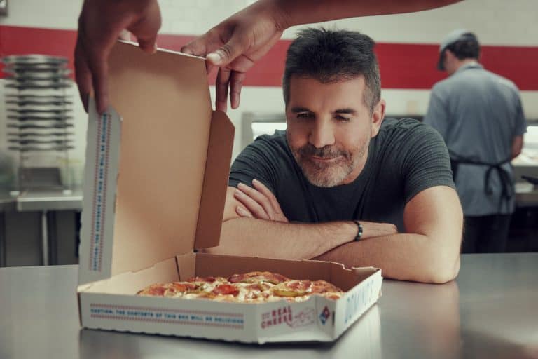 Simon Cowell From Judge to Quality Captain Simon Cowell judging pizza for perfection