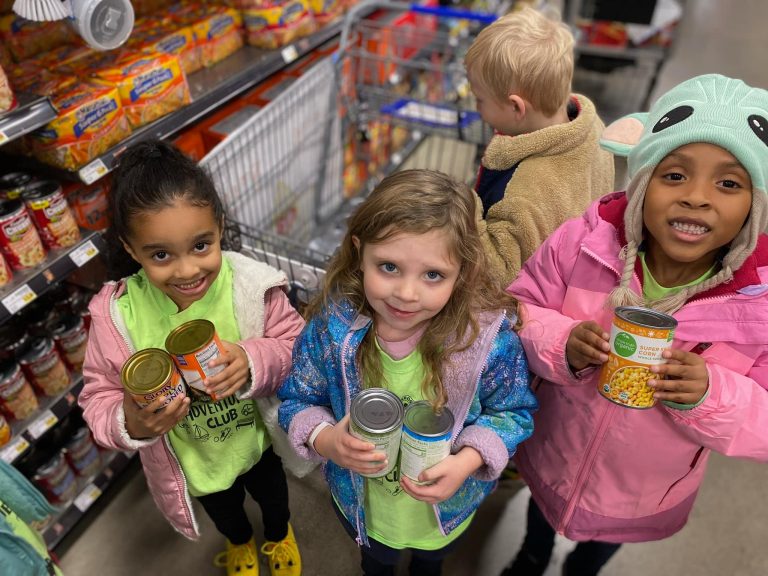 Primrose Schools Nationwide Food Drive Teaches Young Children the Value of Giving Image of kids giving back via Primrose initative