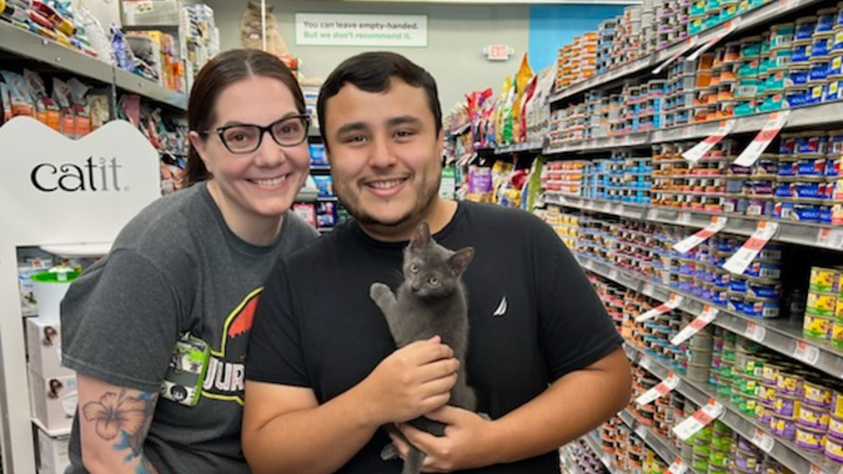 Pet Supplies Plus and Wag N’ Wash Find 17,215 Forever Homes Image of cat with owner for franchise news article about pet adoption