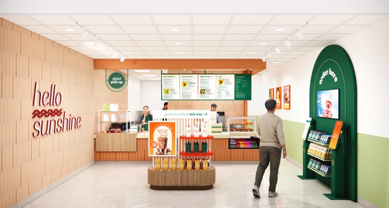 Jamba Joins 2025’s Refresh Revolution with “Hello Sunshine” Store Prototype Jamba Prototype Interior Refresh with customer, counter and wall art.