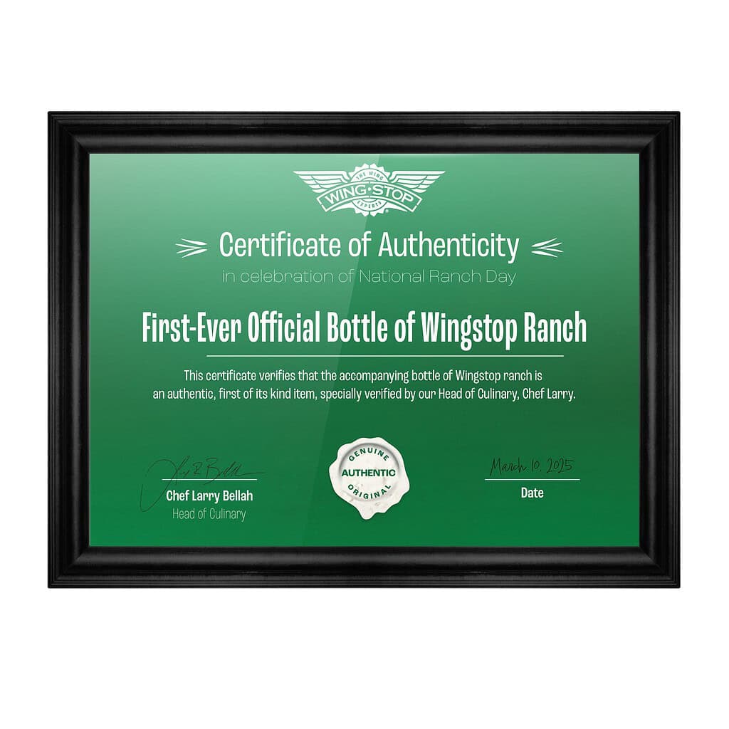 Image of green certificate in black frame