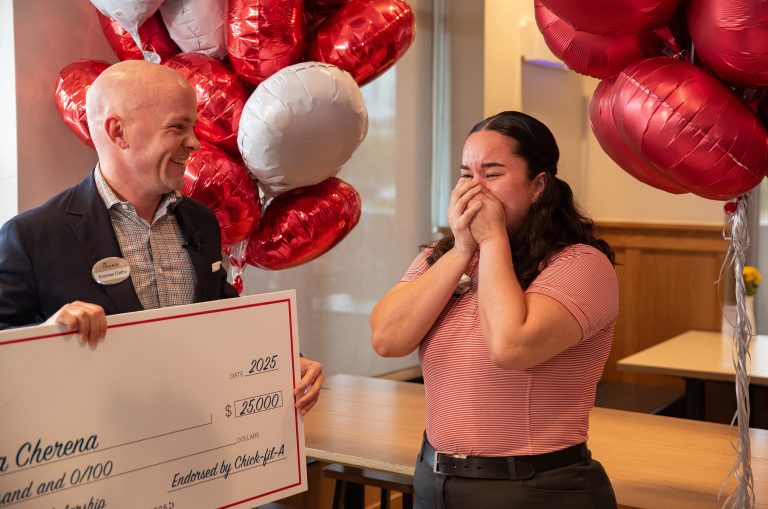 Chick-fil-A Scholarship recipient receiving check