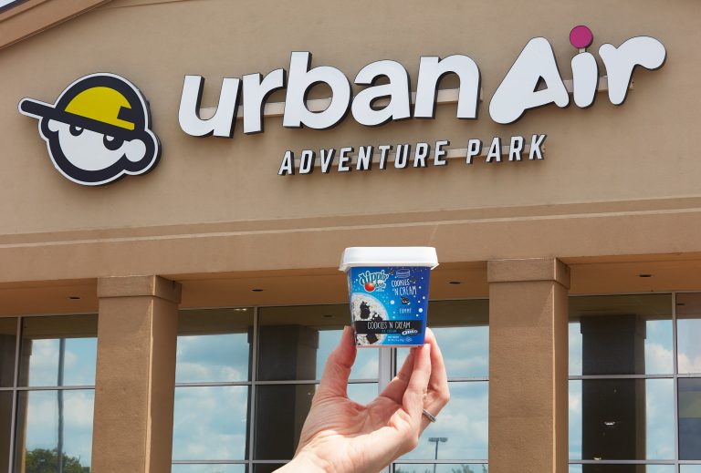 Urban Air Adventure Park And Dippin’ Dots DIPPIN' DOTS in front of storefront of Urban Air Adventure Park