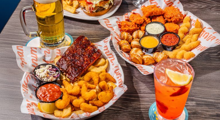 Red Robin holiday menu featuring ribs, shrimp, pretzels, and drinks
