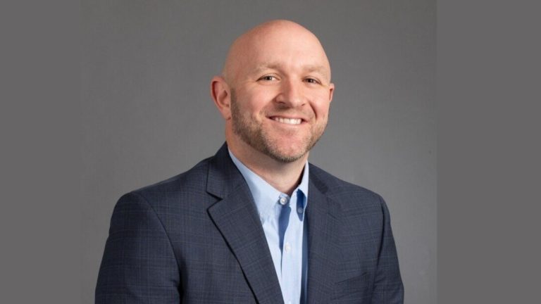 Re-Bath Appoints Jack Jones as New Chief Financial Officer Professional headshot of a smiling business executive in a suit