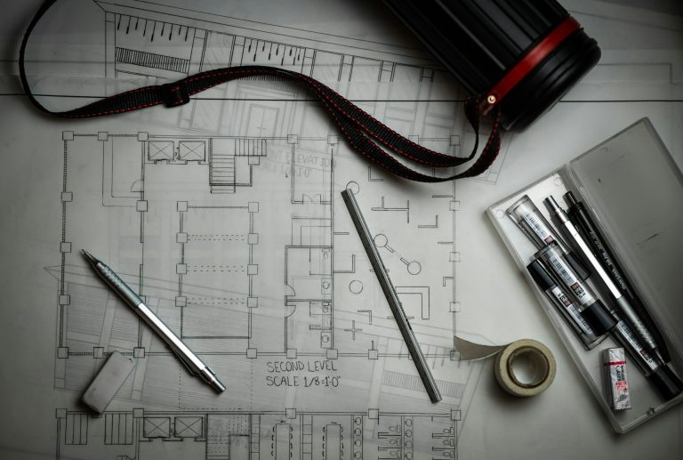 Architect tools on a scaled floor plan for a franchise test fit
