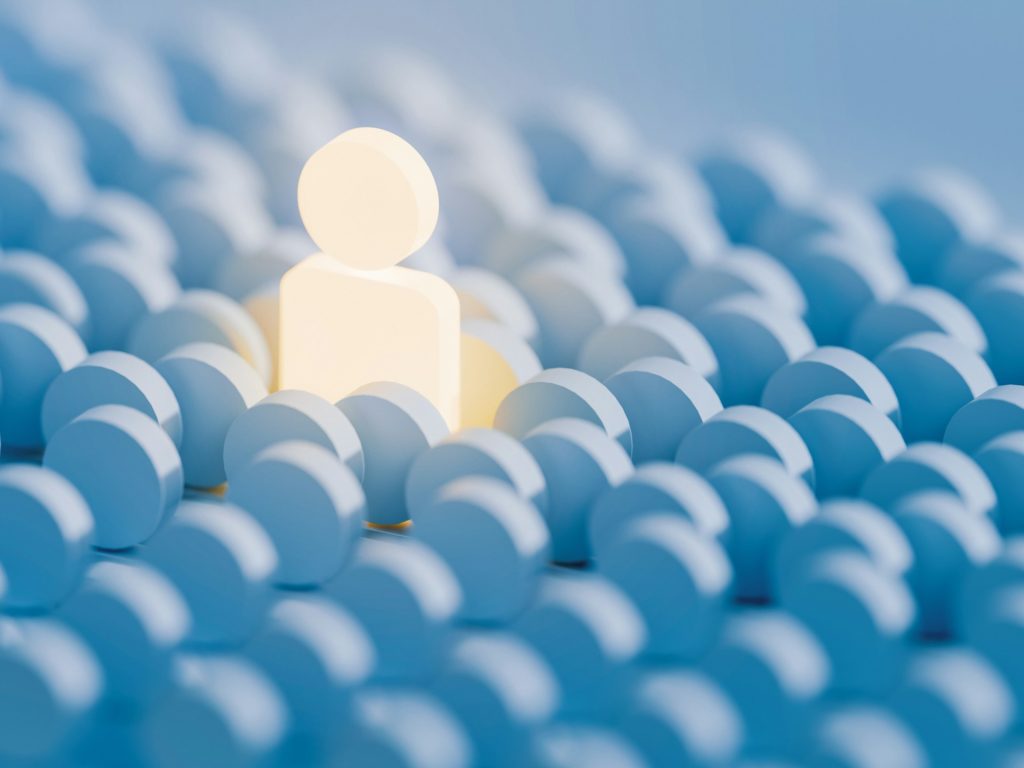 Glowing person icon stands out among many blue discs, symbolizing precise candidate targeting