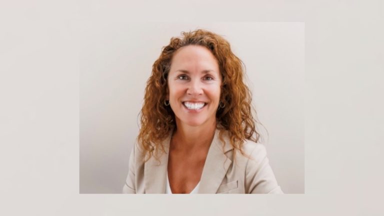 Krystal Promotes Amanda Hyde to Chief Operating Officer Amanda Hyde smiling in professional headshot