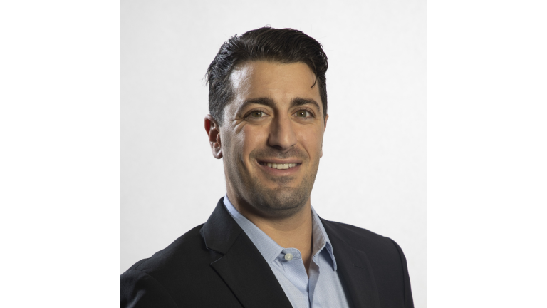 Tyler Semerdjian headshot in business attire