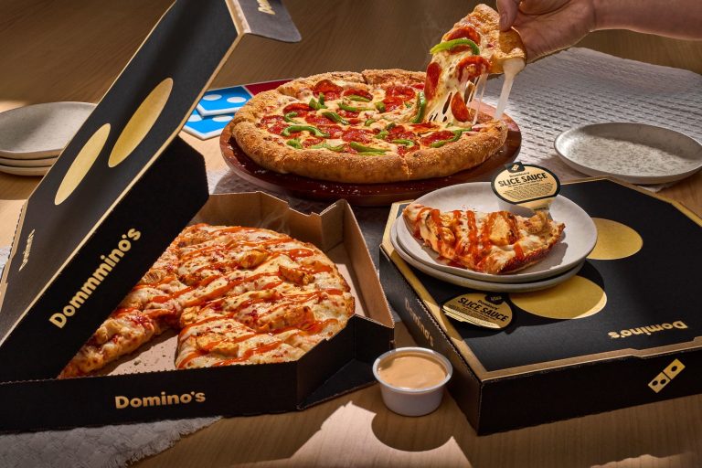 Domino’s Launches 50% Off Pizza Deal Ahead of Football Draft Weekend Domino’s pizzas with Slice Sauce during limited-time football draft promotion
