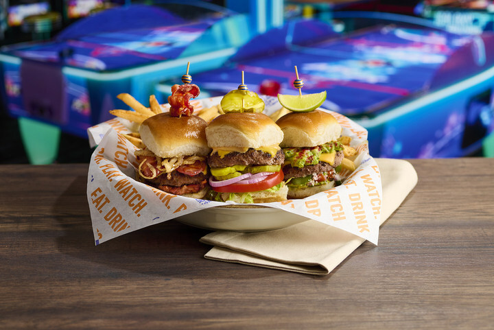 Dave & Buster’s soccer-themed sliders in an arcade