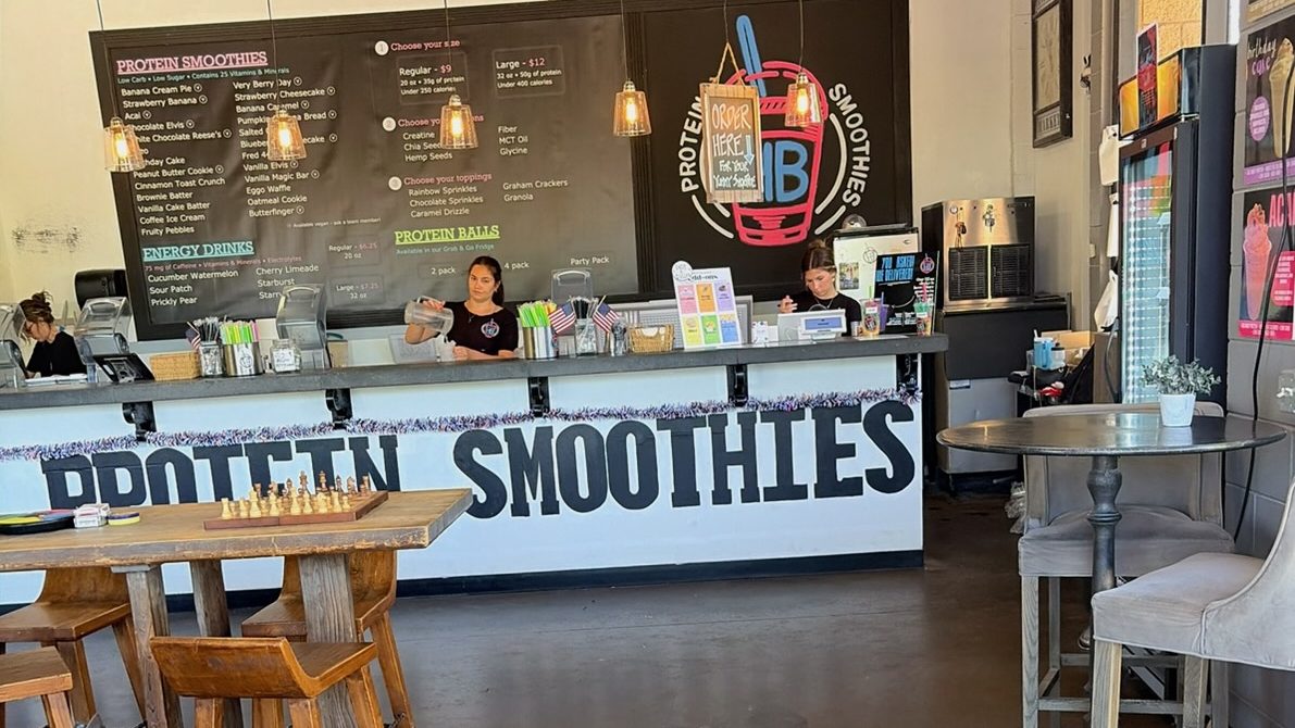 The refreshed interior of the HB Protein Smoothies flagship location featuring updated franchise-focused branding and menu boards.