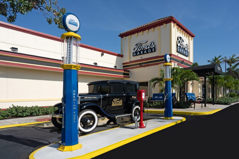 Vintage 1930 Ford Model A parked outside a Ford's Garage restaurant exterior