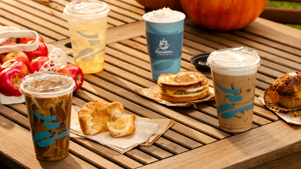 Caribou Coffee fall drinks and food featuring apple, pumpkin and seasonal flavors on an outdoor table
